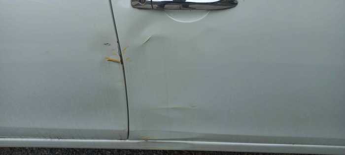 How much to repair dent in car door