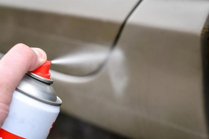 How many spray cans to paint a car