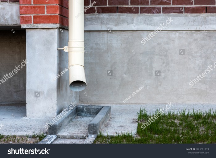 How to fix rain pipe in brick wall