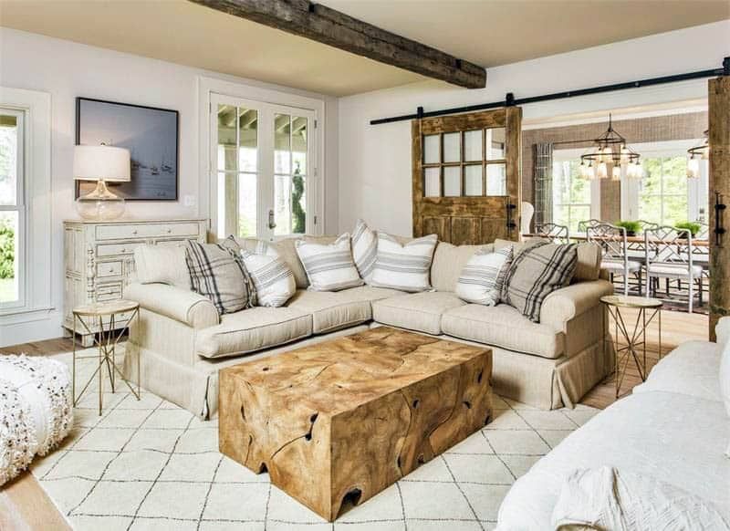 Rustic Barn Door Magic: Transforming Your Living Room with Farmhouse Charm